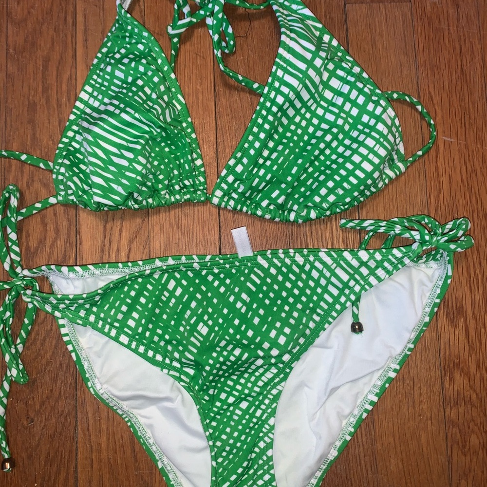 Green and white bathing suit